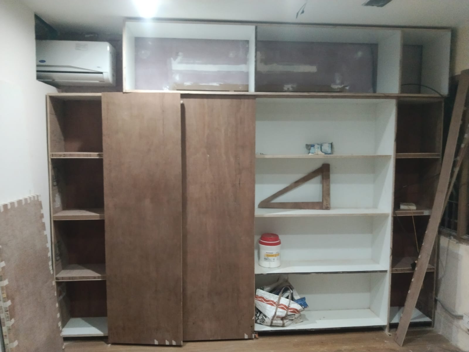 Full-height wardrobe and open storage